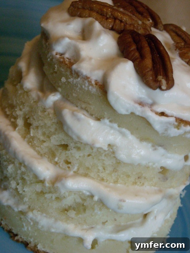 Banana Layer Cake with Caramel Cream by Nutmeg Nanny Assembled Banana Layer Cake with Caramel Cream and Pecans