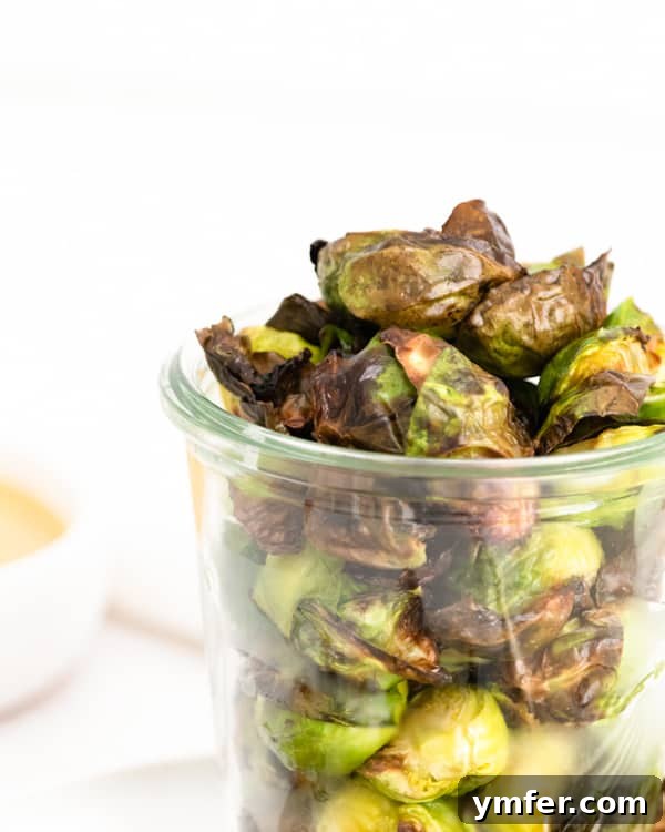 Crispy Air Fryer Brussels Sprouts 5 Air Fryer Brussels Sprouts served in a bowl.