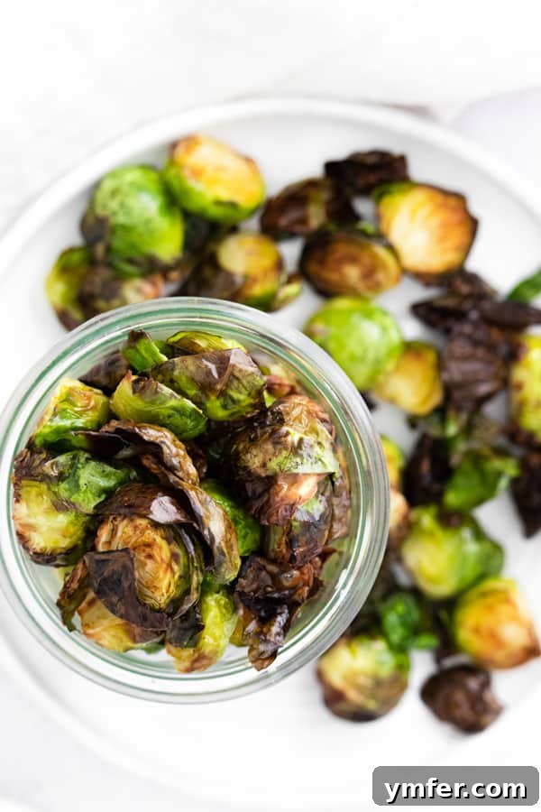 Crispy Air Fryer Brussels Sprouts 3 Air Fryer Brussels Sprouts served in a bowl and on a plate.