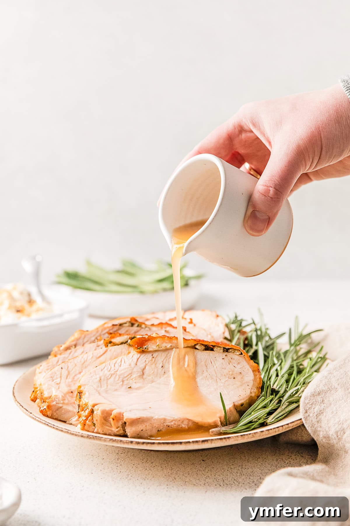 Perfectly Crispy Air Fryer Turkey Breast 2 Pouring gravy on Air Fryer Turkey Breast.