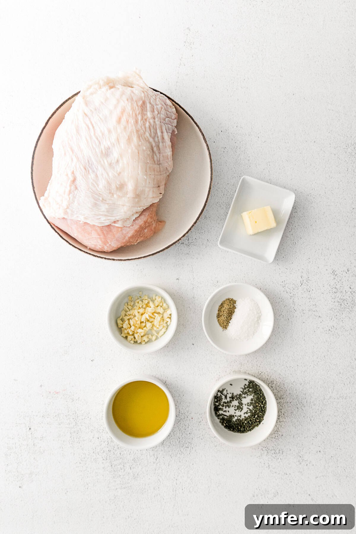 Perfectly Crispy Air Fryer Turkey Breast 4 Ingredients to make air fryer turkey breast on a table.