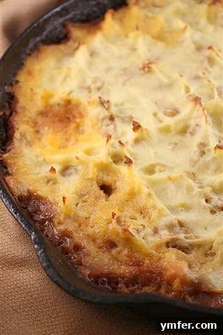 Irish Stout Shepherd's Pie by Nutmeg Nanny This delicious Irish stout shepherd's pie is full of ground lamb and diced vegetables. The Irish stout creates a thick gravy and is topped with potatoes.