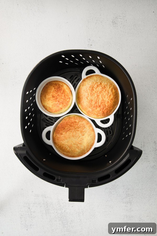 Effortless Air Fryer Frittata 4 Air Fryer Frittata sitting in the air fryer.