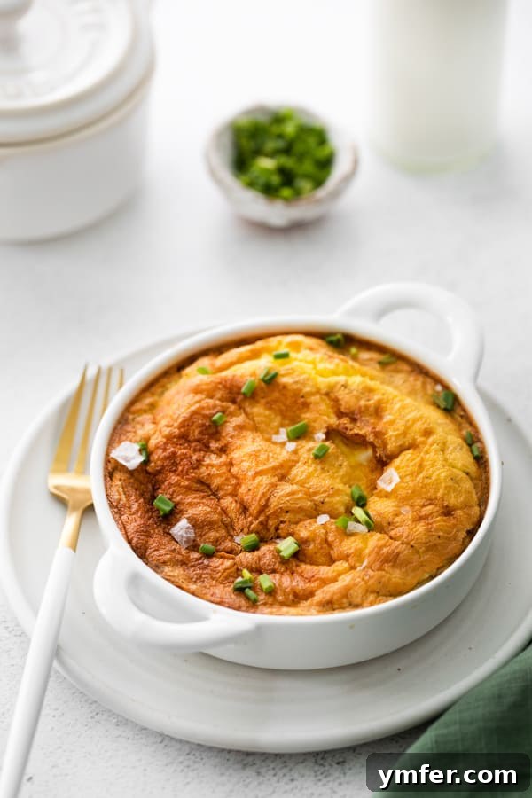 Effortless Air Fryer Frittata 3 Air Fryer Frittata served in a white ramekin.