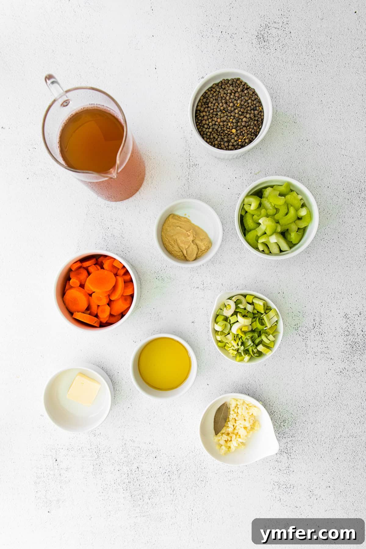 Nourishing French Lentil Potage 3 Healthy French Lentil Soup ingredients on a table.