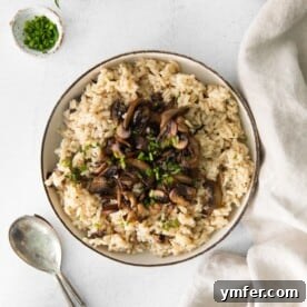 Earthy Wild Mushroom Risotto 7 A beautifully plated bowl of Wild Mushroom Risotto, showcasing its creamy texture and rich ingredients.