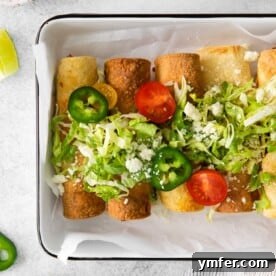 Air Fryer Chicken Taquitos served with toppings.
