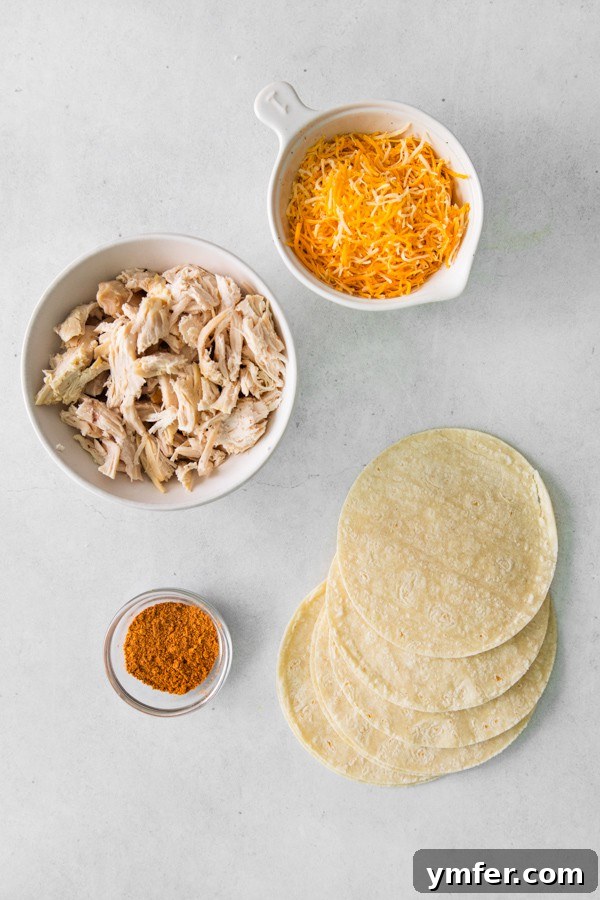 Crispy Air Fryer Chicken Taquitos 3 Ingredients laid out for making Air Fryer Chicken Taquitos.