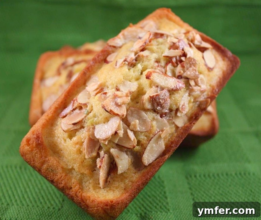 This lime almond coconut oil poundcake is packed full of fresh flavor and is super moist from the use of healthy coconut oil. This is one delicious cake! Delicious Lime Pound Cake with crispy almonds on top, baked to golden perfection.