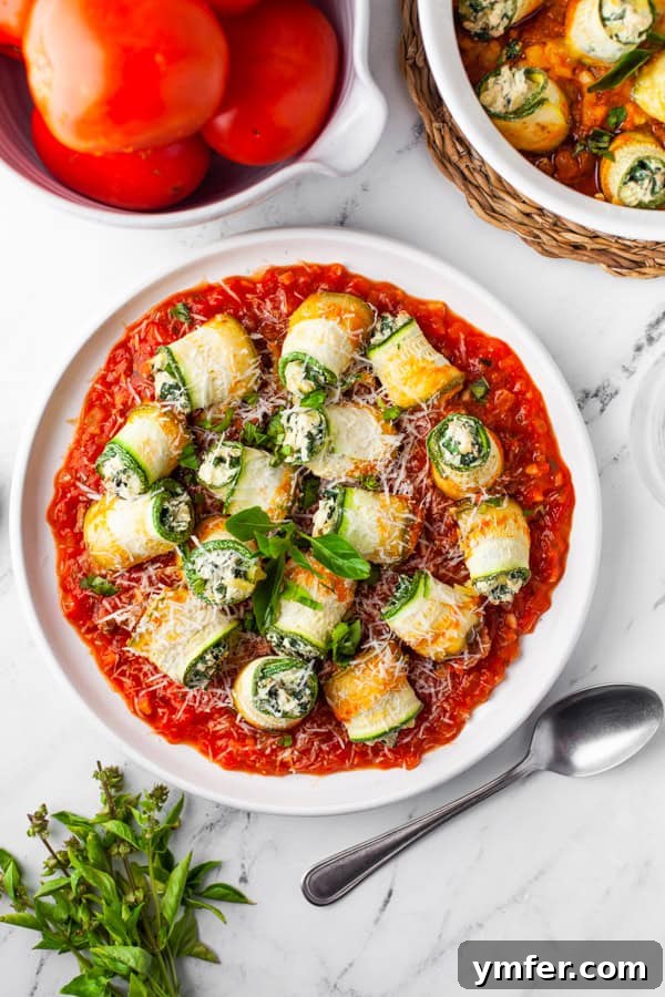 Zucchini Lasagna Rolls on a plate. 