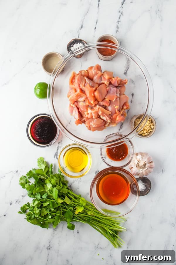 Sweet Heat Chicken Kebabs 3 Ingredients to make Hot Honey Chicken Skewers sitting on a table.