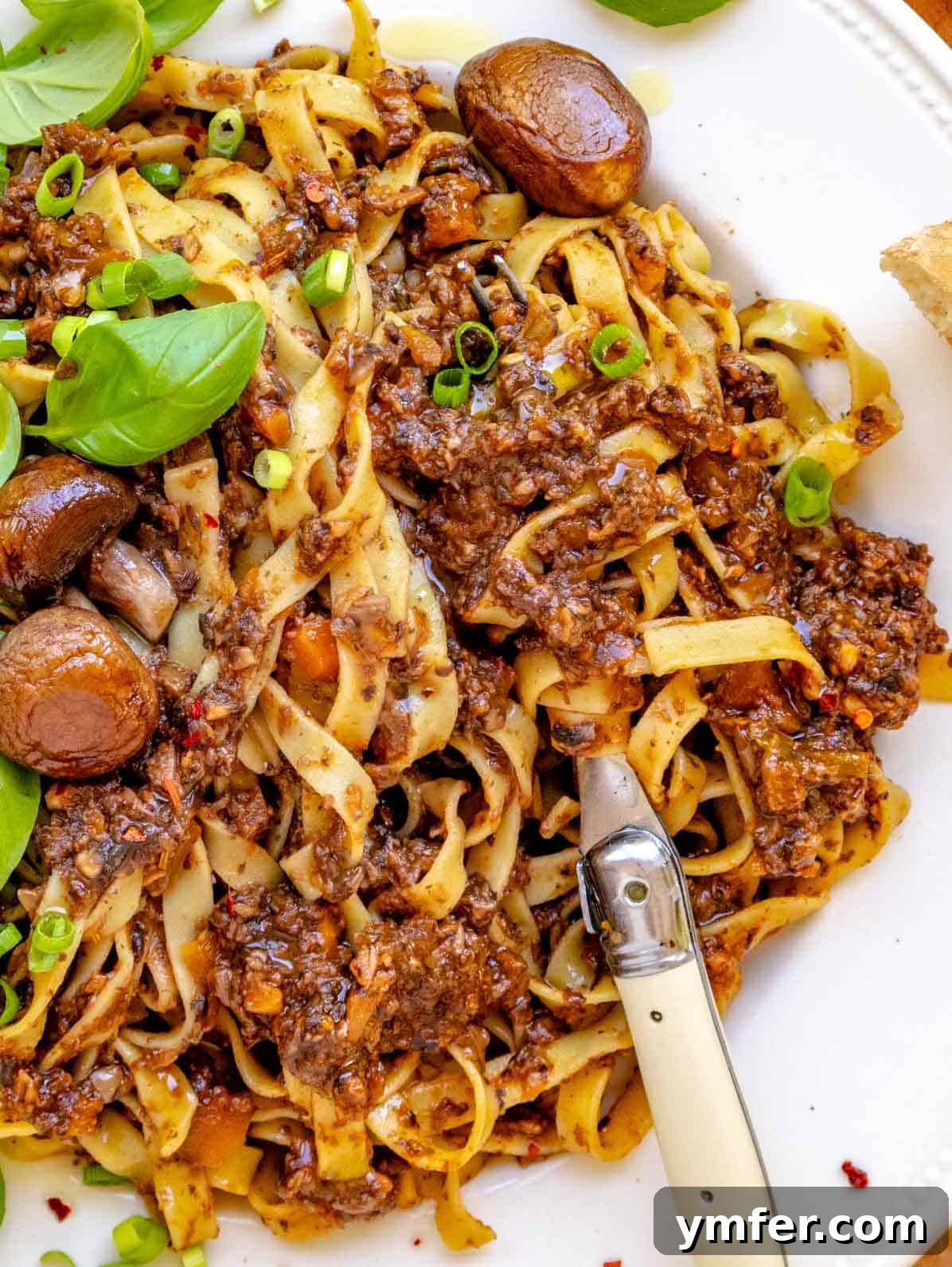Rich Fungi Ragout 2 Easy mushroom bolognese with fettuccine and a fork