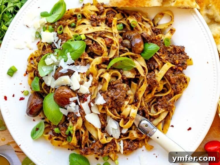 Rich Fungi Ragout 17 mushroom bolognese with parmesan cheese and fresh basil