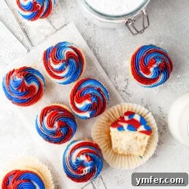 Patriotic Party Cupcakes 2 Vibrant red, white, and blue swirled Fourth of July cupcakes on a festive platter.