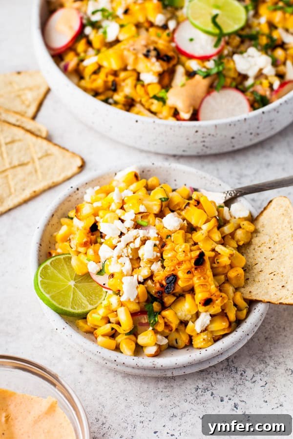 Charred Street Corn Fiesta 5 Mexican Corn Salad in a serving bowl