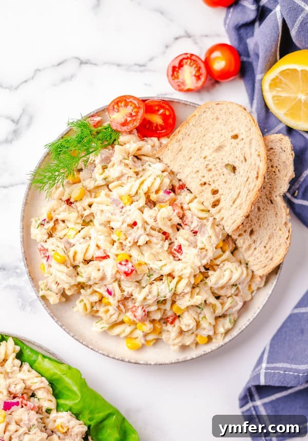 Tuna Pasta Salad on a plate with bread.