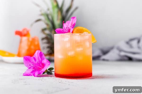 Tropical Rum Delight 6 Pineapple Rum Punch in a glass.