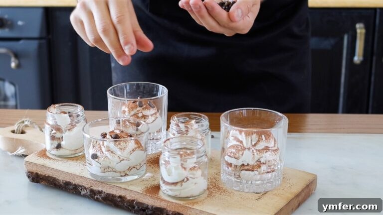 portioning the coffee mousse into small glasses