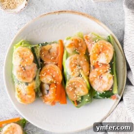 Shrimp Summer Rolls served with dipping sauce, viewed from above, ready to be enjoyed.