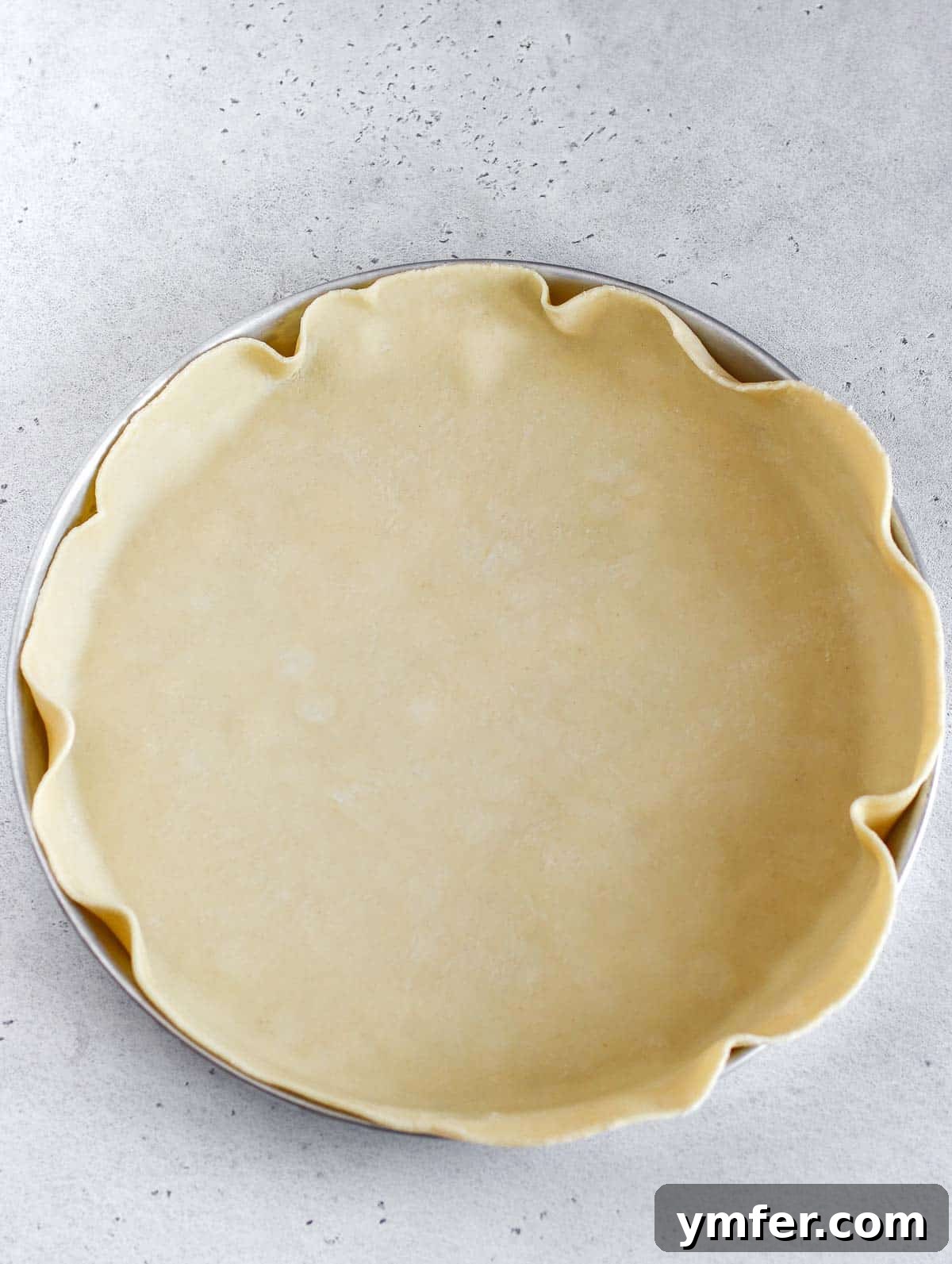 Wholesome Vegan Zucchini Pie 11 Pie dish with the rolled out pie crust inside