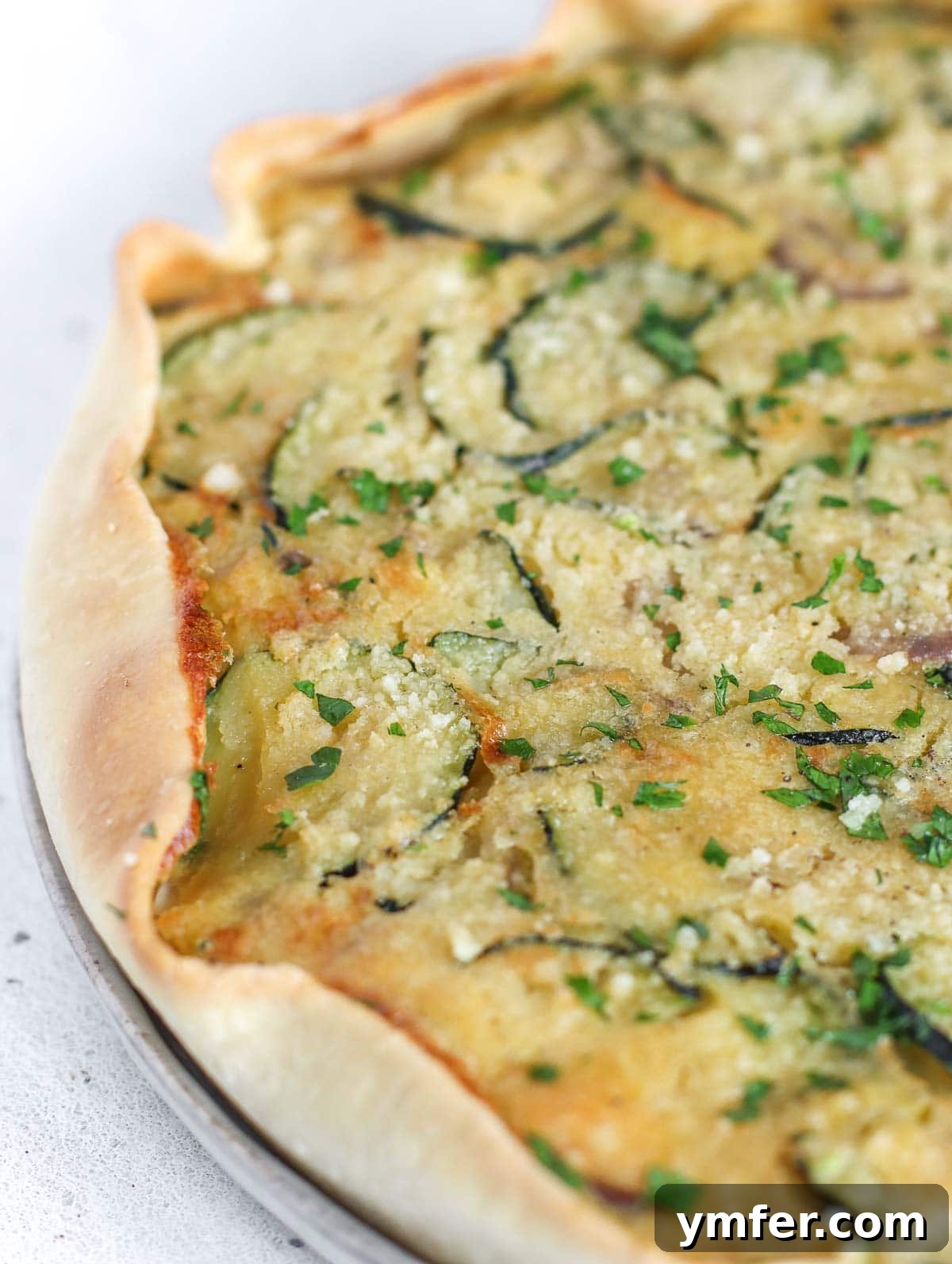 Wholesome Vegan Zucchini Pie 3 Whole Vegan Zucchini Pie on a cooling rack