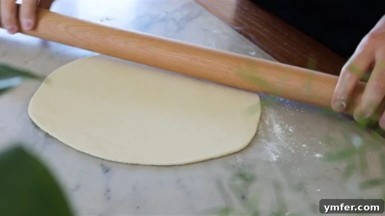 Wholesome Vegan Zucchini Pie 21 Rolling the pie dough