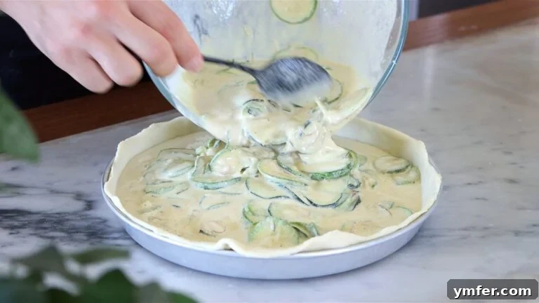 Wholesome Vegan Zucchini Pie 24 Transferring the batter into the pie crust