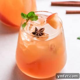 A refreshing Apple Cider Mojito in a glass, ready to be enjoyed.