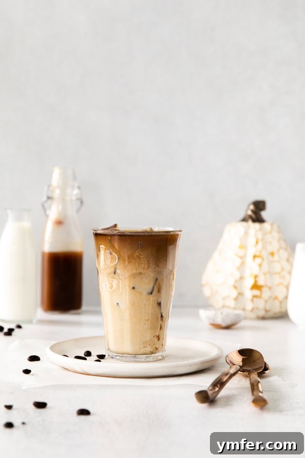 Iced Pumpkin Chai Latte served with milk. 