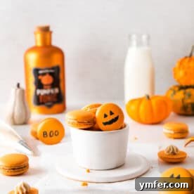 Seasonal Pumpkin Spice Macarons 8 A perfectly baked pumpkin spice macaron with smooth shell and defined feet, showcasing its inviting texture.