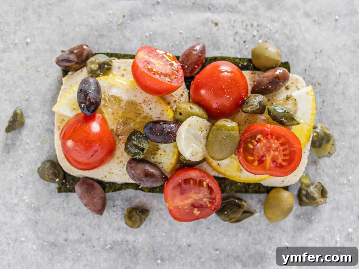 The Vegan Catch 11 tofu with olives, cherry tomatoes and garlic