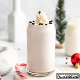 Candy Cane Crunch Milkshake 9 Peppermint Bark Milkshake in a glass.