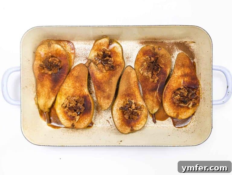 Baked pears fresh out of the oven, golden brown and tender.