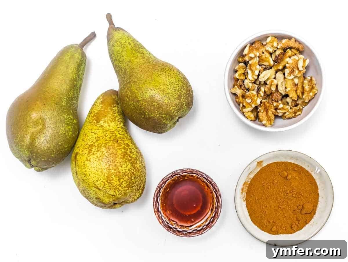 Arrangement of fresh pears, cinnamon, pecans, and maple syrup—all the ingredients for baked pears.