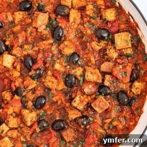 High protein tofu cacciatore in a skillet, ready to be served.