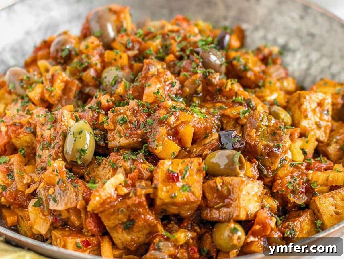 The Forager's Tofu Cacciatore 6 Tofu cacciatore with an abundance of olives, simmering beautifully in a large skillet.