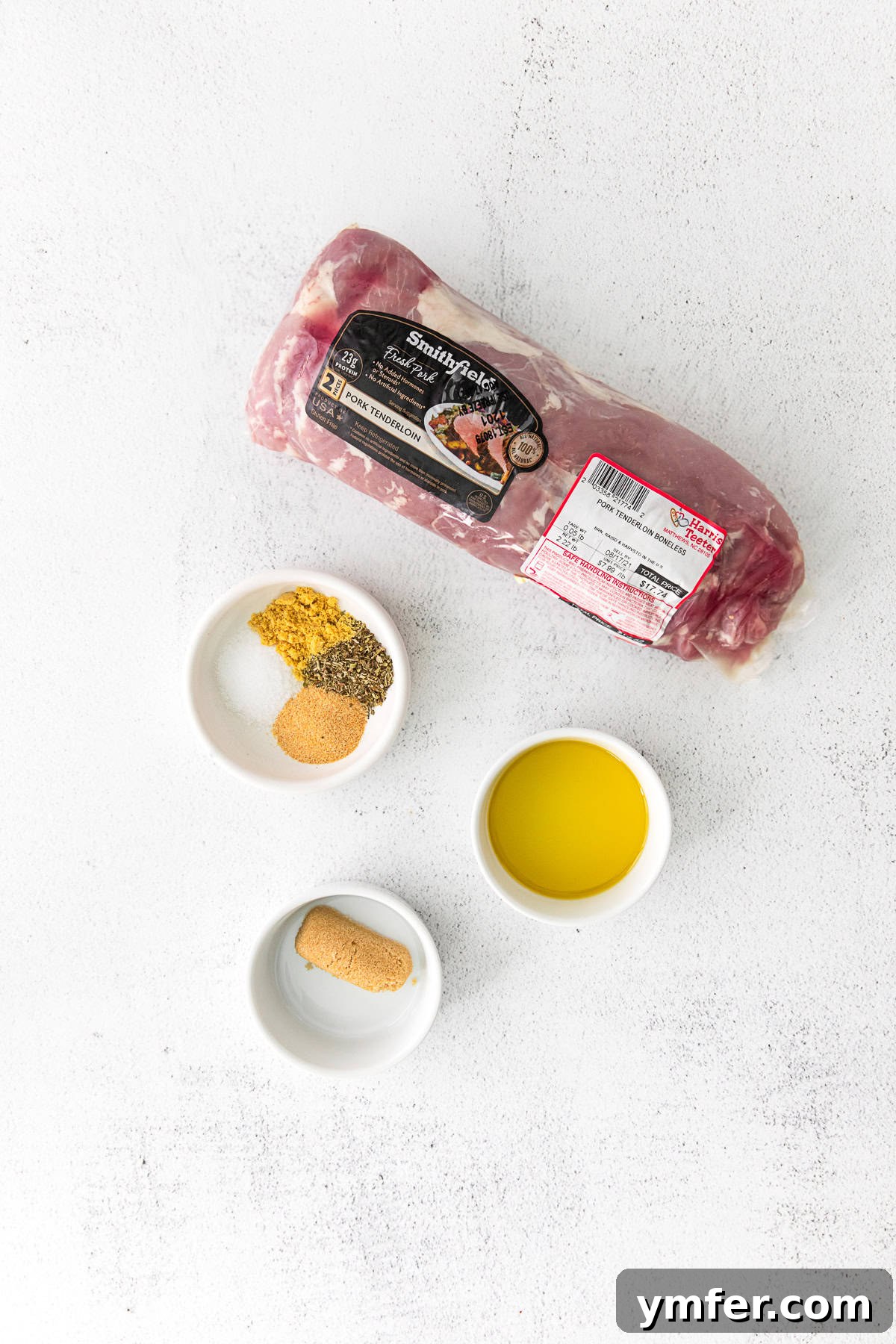 Perfect Air Fryer Pork Tenderloin 3 Ingredients for air fryer pork tenderloin laid out on a table.