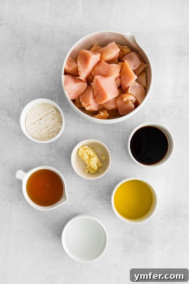Sticky Honey Garlic Chicken Bowls 3 Ingredients for Honey Garlic Chicken Bowls laid out on a table.