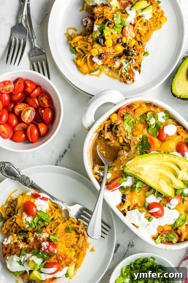 Zesty Southwestern Air Fryer Spaghetti Squash 7 A large casserole dish filled with Air Fryer Southwest Spaghetti Squash, topped and ready to serve.
