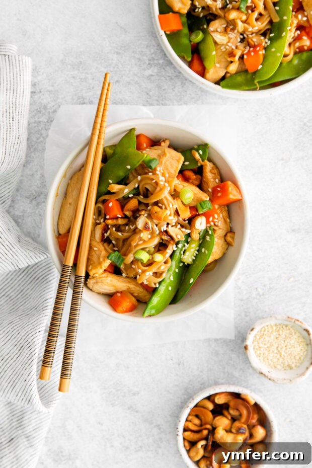 Savory Cashew Chicken Pad Thai 2 Cashew Chicken Pad Thai in a bowl with chopsticks.