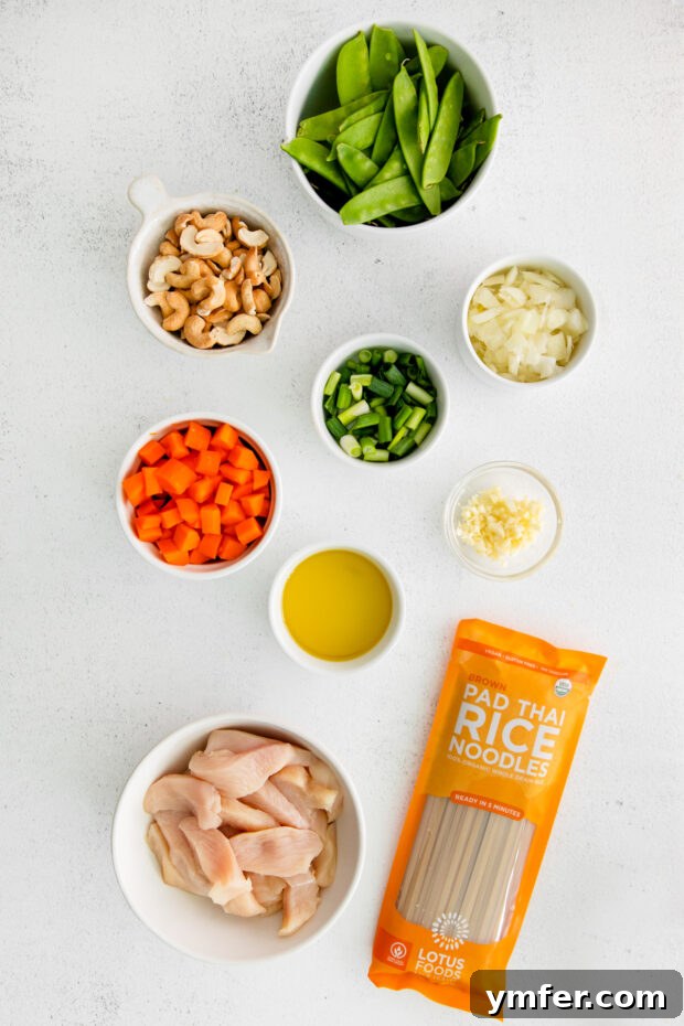 Savory Cashew Chicken Pad Thai 3 Ingredients to make Cashew Chicken Pad Thai on a table.