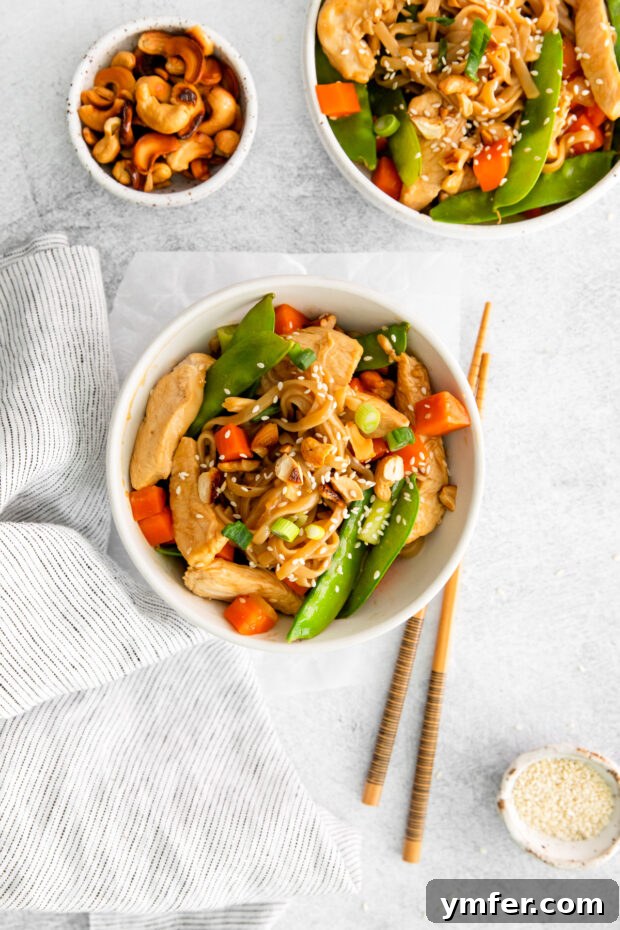 Savory Cashew Chicken Pad Thai 9 Cashew Chicken Pad Thai in a bowl with chopsticks.
