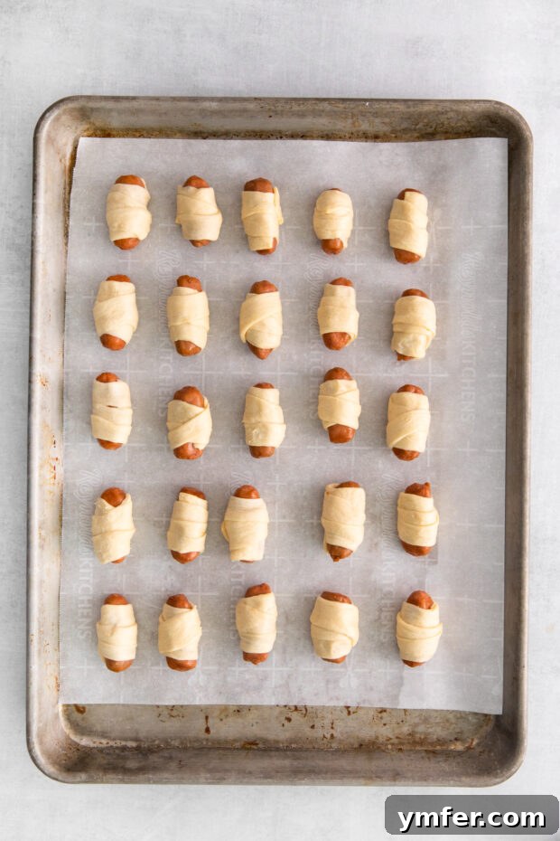 Crunchy Everything Piggy Rolls 5 Lil' smokies wrapped in crescent dough.