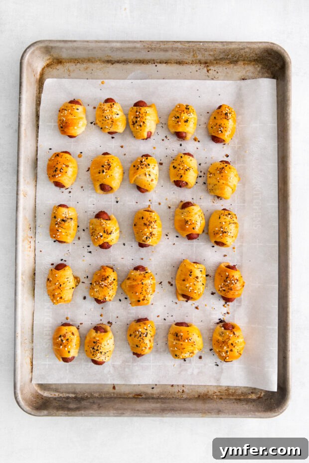 Crunchy Everything Piggy Rolls 7 Cooked Everything Bagel Pigs in a Blanket.