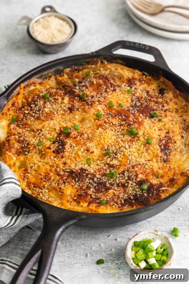 Ultimate Homemade Scalloped Potatoes 9 Homemade Scalloped Potatoes baked in a skillet, topped with golden panko breadcrumbs and fresh herbs.