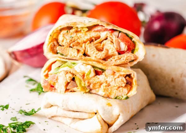 Zesty Buffalo Chicken Wrap 7 A perfectly rolled Buffalo Chicken Wrap, ready to be enjoyed.