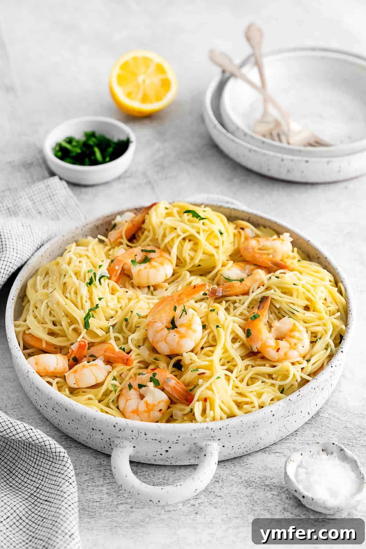 Effortless Instant Pot Shrimp Scampi 12 Instant Pot Shrimp Scampi in a round bowl with parsley on top.