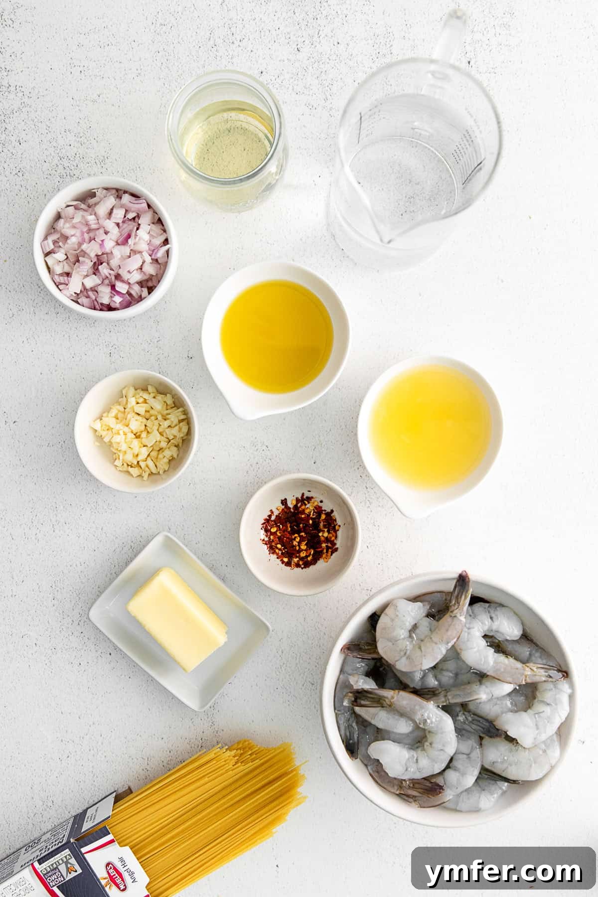 Effortless Instant Pot Shrimp Scampi 3 Ingredients for Instant Pot Shrimp Scampi on a table.