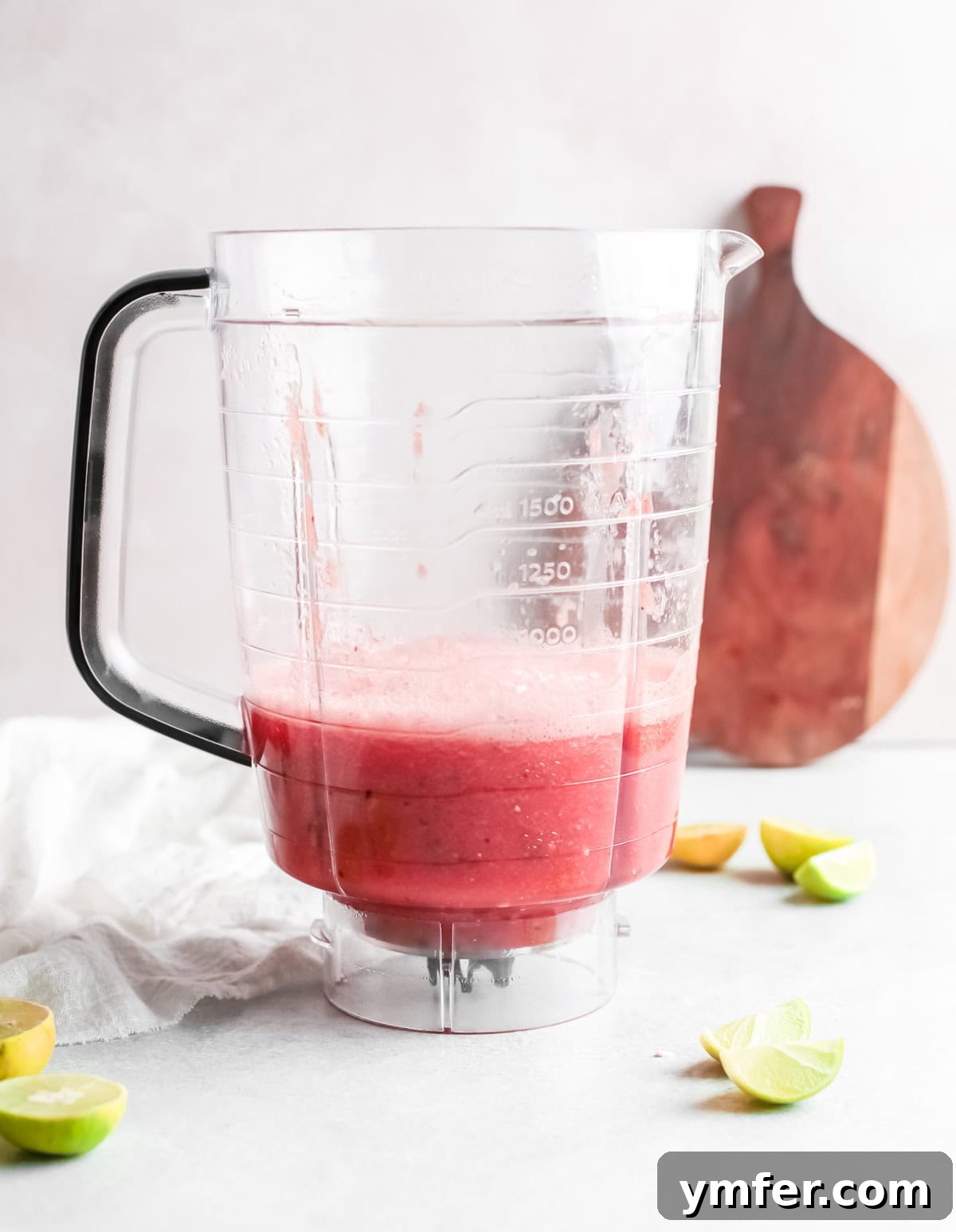Blush Paloma 8 Blended watermelon in a blender container.