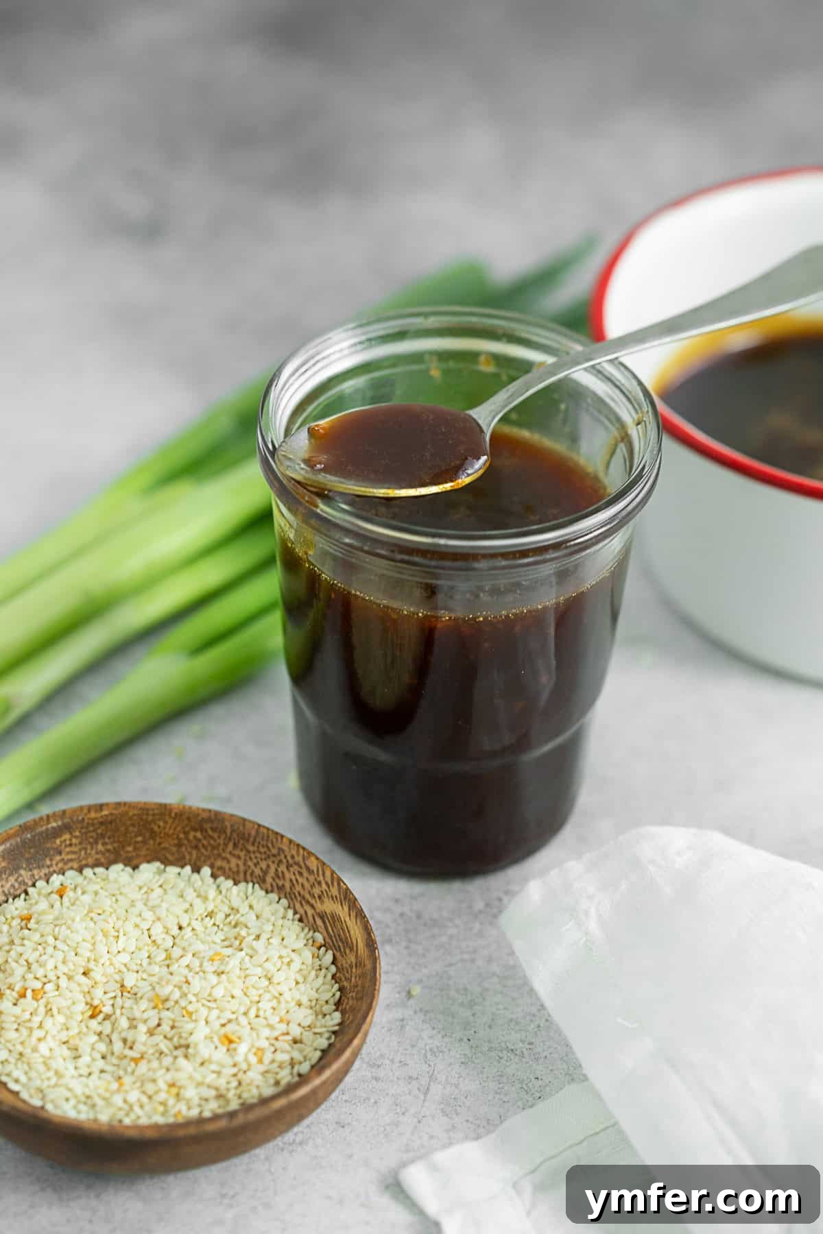 Simple Homemade Teriyaki 7 Homemade Teriyaki Sauce in a small glass jar, ready for use or storage.